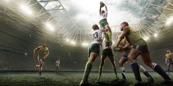 Rugby gracze walczą o piłkę na stadionie rugby zawodowych - Zdjęcie, obraz