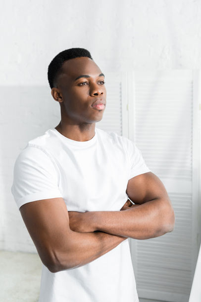 confident african american man crossed arms on his chest and looking away - Photo, Image