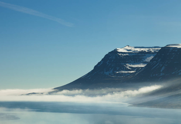 Foggy landscape of the fjords of Iceland - Photo, Image