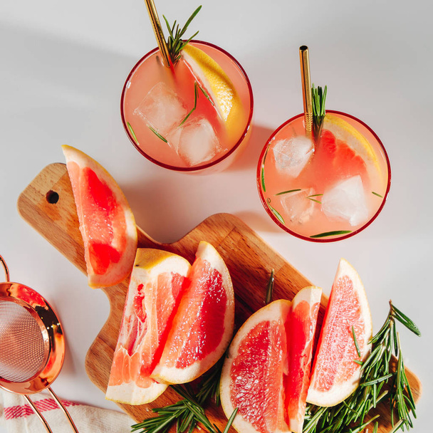 Grapefruit and Rosemary cocktail.  Refreshing and non-alcoholic drink perfect for spring or summer.   - Photo, image
