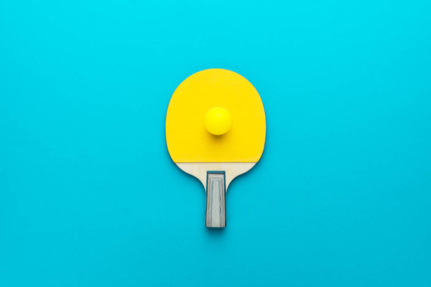 flat lay image of table tennis paddle with a ball central composition - Φωτογραφία, εικόνα