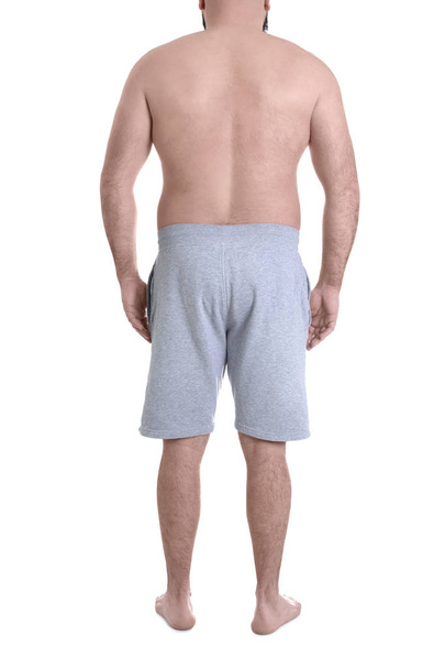 Overweight man isolated on white, closeup. Weight loss - Φωτογραφία, εικόνα