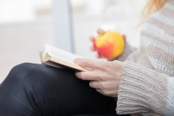 adult woman hands with book, reading - Φωτογραφία, εικόνα