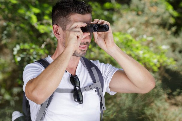 hiker with binoculars and man - Foto, imagen