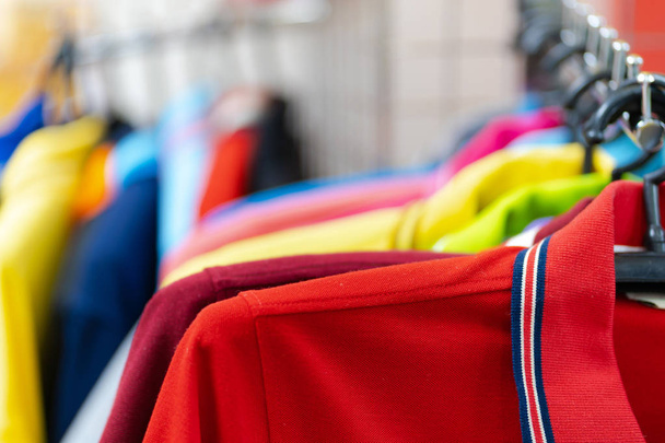 Close up of Colorful polo shirt on hangers - Photo, Image