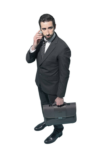 Corporate businessman using a smartphone - Photo, Image