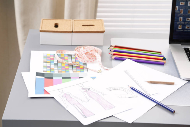 Designers desk with architectural tools and notebook - 写真・画像