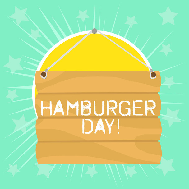 ハンバーガーの日を示すテキスト記号。概念的な写真は、サンドイッチフックアップブランクサインプレートのこの最も魅力的な歴史を祝います。ハングのためのロープと空の木製の看板. - 写真・画像