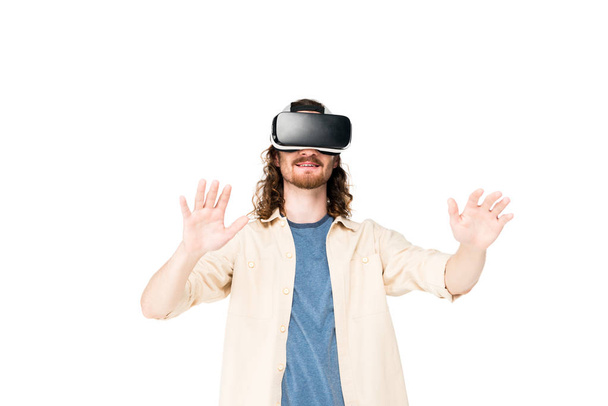 young man using VR headset isolated on white  - Fotoğraf, Görsel