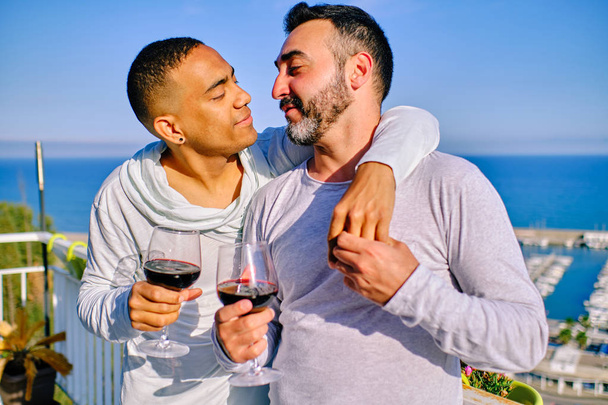 a couple of interracial gay men - Photo, Image