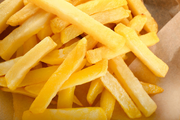 Smakelijke knapperige frietjes, close-up - Foto, afbeelding