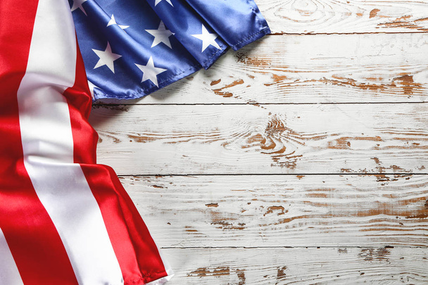 Flag of the United States of America on wooden background. Independence Day celebration - Photo, Image