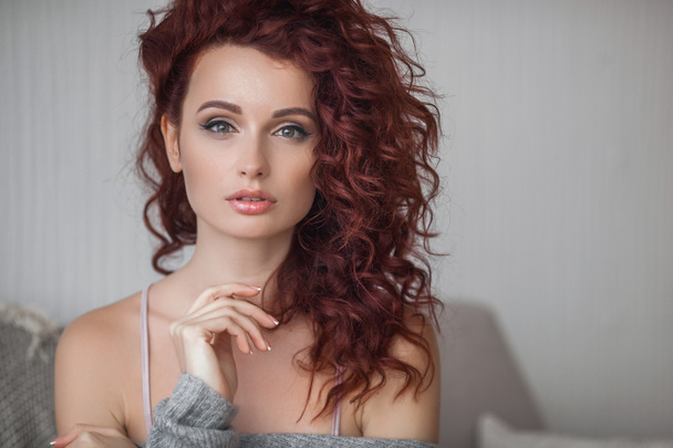 Very attractive young woman close up portrait. Beautiful female indoor. Curly haired lady. Red-haired girl. Redhead with wavy hair. - Photo, Image