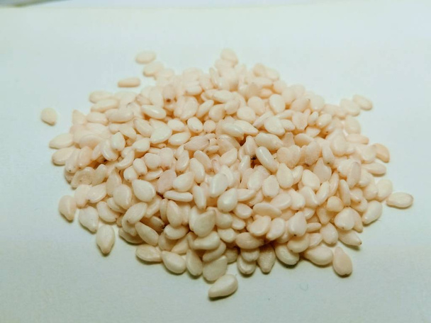 White sesame seeds isolated on white background - Photo, Image