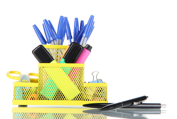Office equipment in yellow stationary holder isolated on white - Foto, Imagen