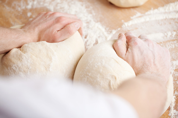 Baker kneading bread dough - Fotoğraf, Görsel