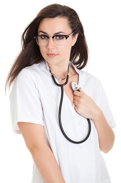 Sexy nurse with stethoscope. female doctor - isolated over a wh - 写真・画像