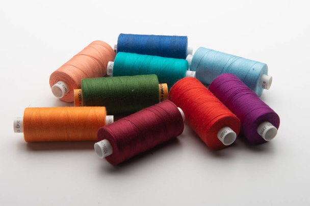 Rainbow colored sewing thread lined - Photo, Image