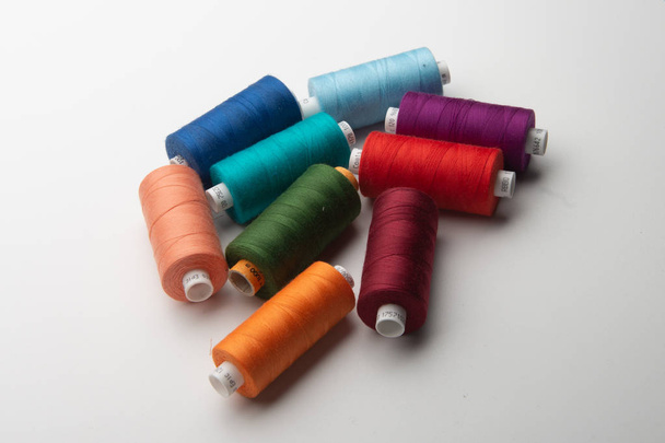 Rainbow colored sewing thread lined - Photo, Image
