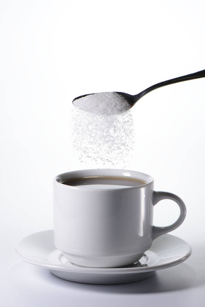 Sugar falling from a spoon - Foto, Imagem