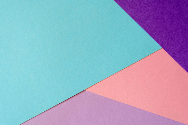 Multicolored paper background in soft blue, violet, lilac and coral colors. - Fotografie, Obrázek
