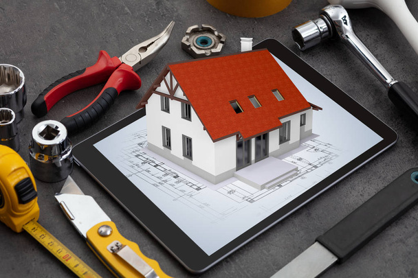 Tablet e ferramentas com conceito de plano de casa 3d
 - Foto, Imagem