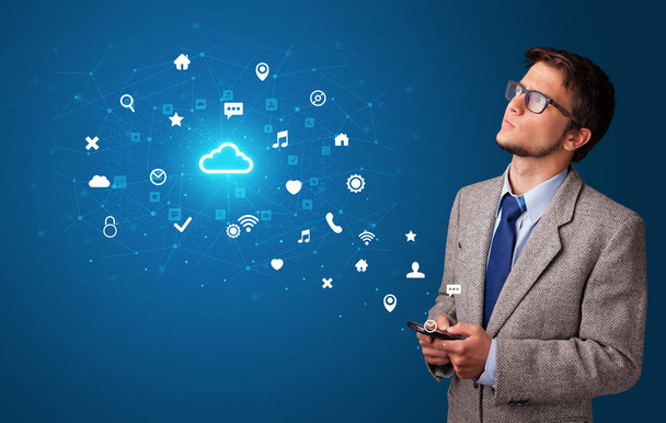 Person using phone with cloud technology concept - Foto, Imagen