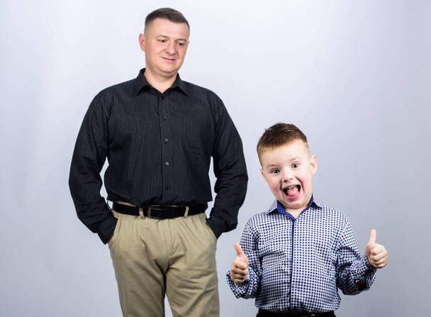 Father and cheerful little son. Best friends. Dad and adorable child. Father example of noble human. Family support. Family bonds. Trustful relations father and son. Enjoying fatherhood. Fathers day - Zdjęcie, obraz