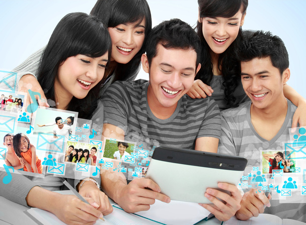 Friendly group of students with tablet pc - Foto, Imagen