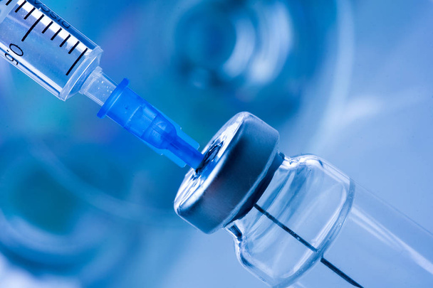 Vaccine vial dose flu shot drug needle syringe,medical concept vaccination hypodermic injection - Photo, image