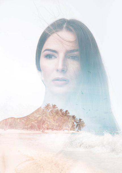 Double exposure portrait of a young thoughtful woman combined with photograph of ocean landscape. Conceptual image showing unity of human with nature. Freedom. Summer vacation. Isolated on white background - Photo, Image