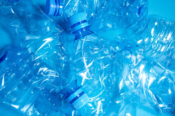 Crumpled plastic bottles of mineral water. - Fotó, kép