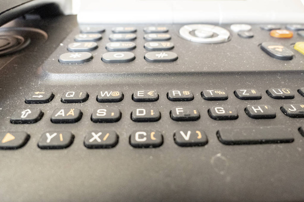 Telephone with buttons in the close-up view office - Photo, Image