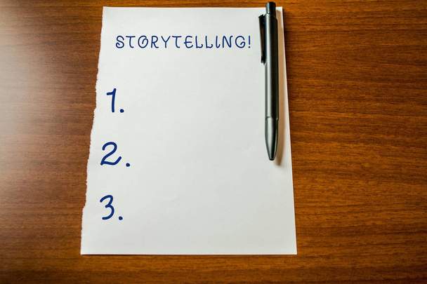 Handwriting text Storytelling. Concept meaning activity writing stories for publishing them to public Upper view blank stationary paper lying wooden table pen. Writing essay. - Photo, Image