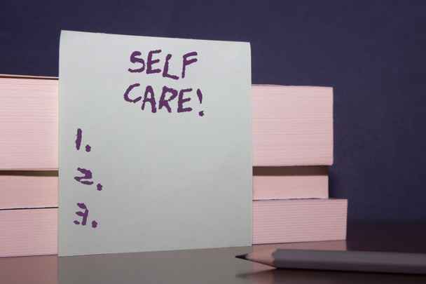 Text sign showing Self Care. Conceptual photo practice of taking action to preserve or improve ones own health Close up three wooden different sizes rectangle boxes paper sheet pencil. - Photo, Image