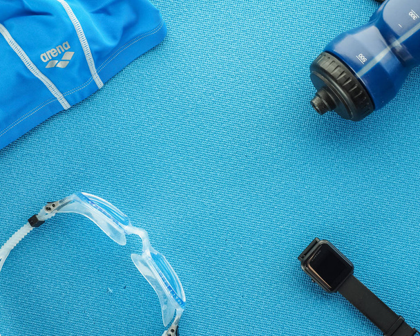 Flat lay composition with equipment for swimming pool  on blue b - Foto, imagen