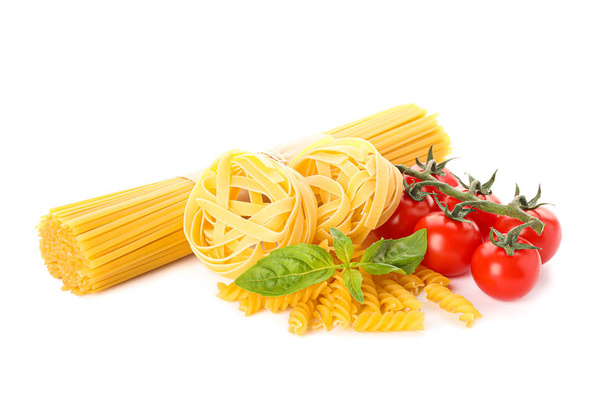 Pasta and vegetables isolated on white background. Uncooked whol - Photo, Image