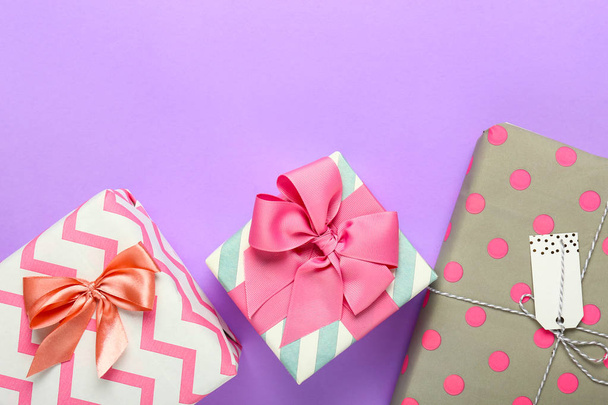 Beautiful gift boxes on color background - Φωτογραφία, εικόνα
