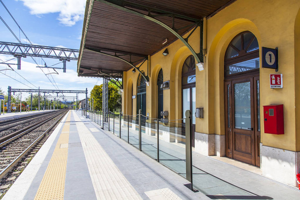 Desenzano del Garda, Italy, on April 27, 2019. Platforms of the railway station - Фото, изображение
