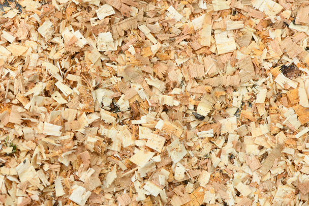 A Freshly Laid Layer of Large Garden Bark Woodchips. Woodchips used as safe soft surface in a childrens play park, Top Down View.  - Photo, Image