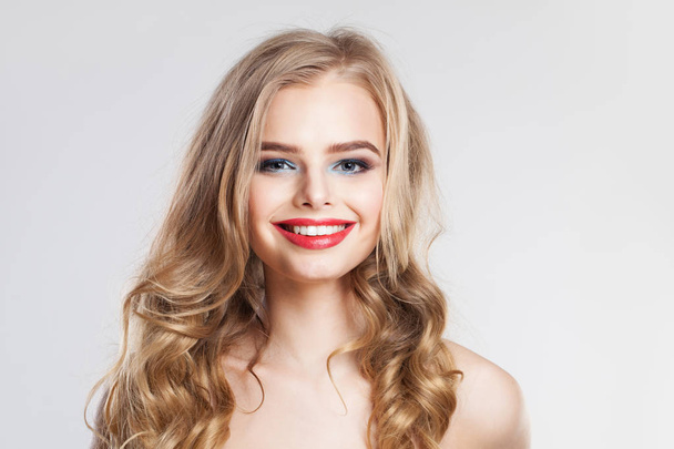 Smiling woman with blonde curly hairstyle. Pretty girl  - Photo, Image