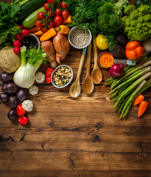Assortment of fresh vegetables on wooden background - Photo, Image