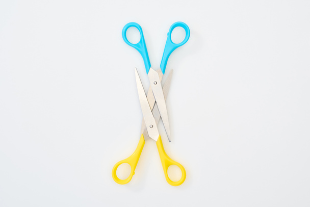 top view of colourful scissors isolated on white - Photo, Image