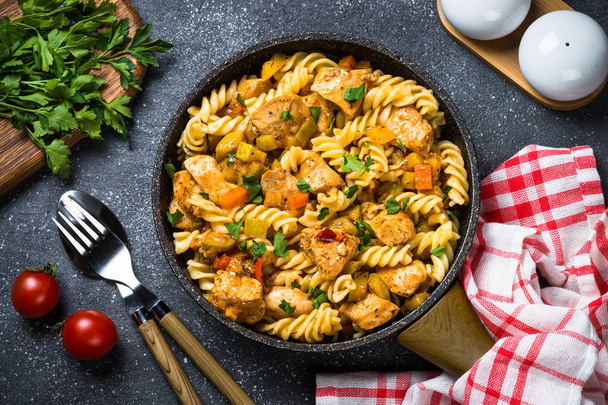 Pasta with Chicken and vegetables, top view. - Foto, Bild