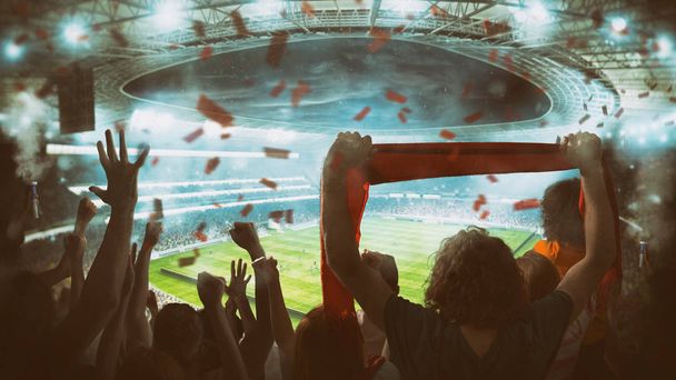 Fotbalová scéna v noci zápas s fanoušky roztleskávání na stadionu - Fotografie, Obrázek