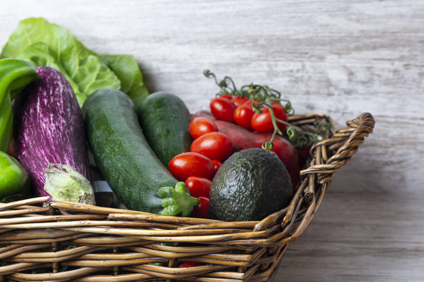 Wicker basket with fresh vegetables healthy diet for summer - Image - Fotoğraf, Görsel