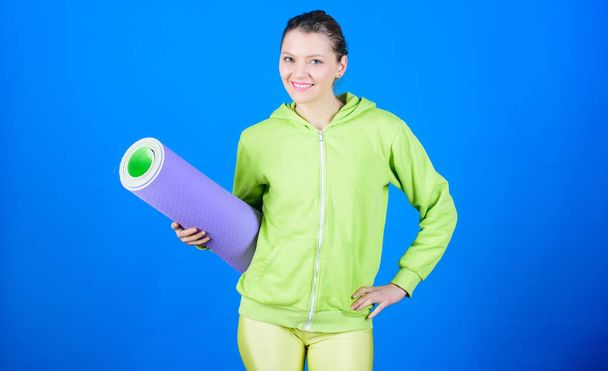 Health diet. Success. Strong muscles and power. Sporty woman training in gym. Happy woman workout with fitness mat. Sport mat equipment. Athletic fitness. time to relax. relax after sport class - Фото, изображение