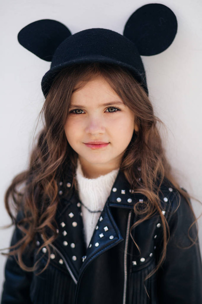 Cute Little Girl in leather jacket, Happy Childhood Concept - 写真・画像