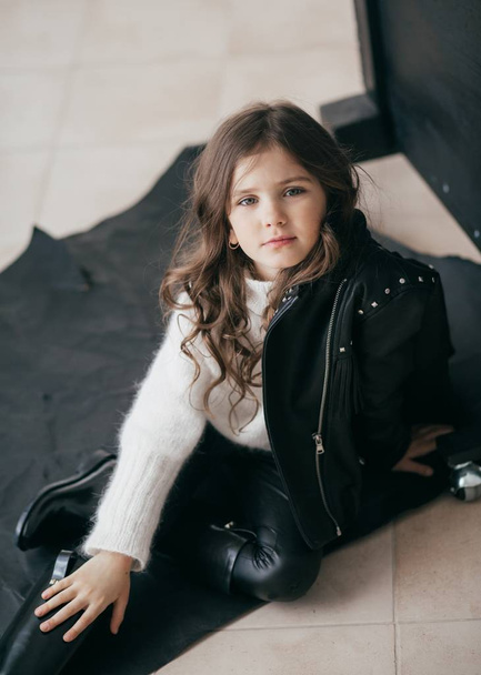 Cute Little Girl in leather jacket, Happy Childhood Concept - Foto, Imagen