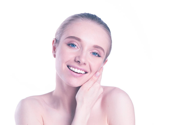 Beautiful face of young smiling woman with clean fresh skin - isolated on white - Φωτογραφία, εικόνα